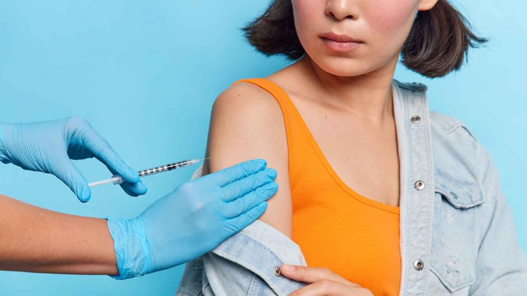 a woman getting an injection