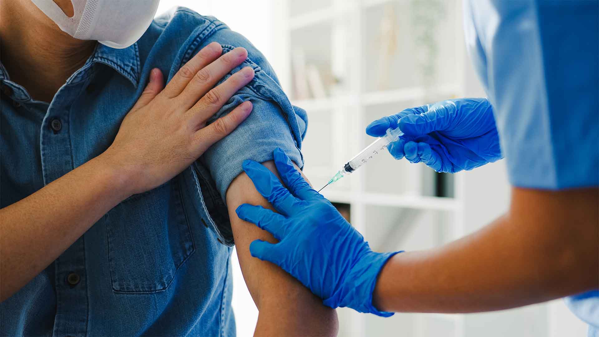 a person getting a shot